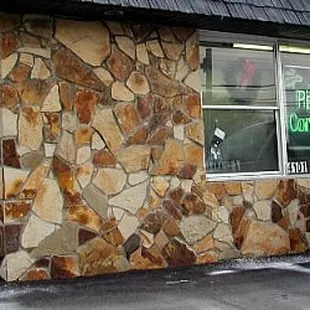 a van parked in front of the restaurant