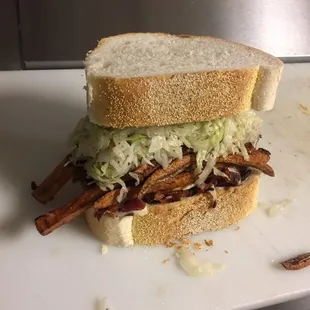 Our untouchable. Your choice of meat, topped with cheese, fries, and coleslaw all on fresh cut Italian bread.