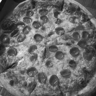 a pepperoni pizza in a box