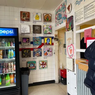 a woman standing in front of a vending machine