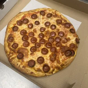 Pepperoni pizza, and a pepper and olive pizza.