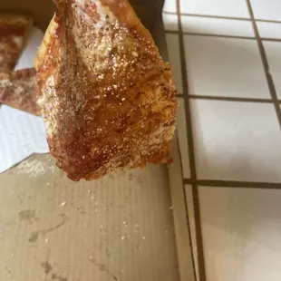 Soggy pizza that should've been extra cheese but there no cheese