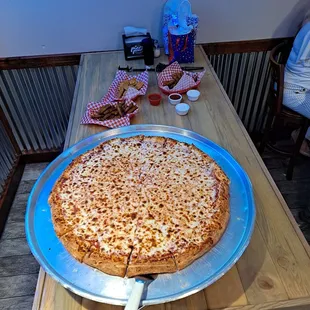 Biggest pizza I&apos;ve eaten.. makes the table look small.