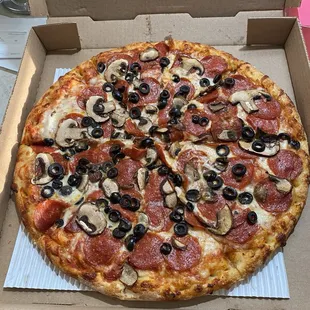Large pepperoni, mushroom, olives, well done