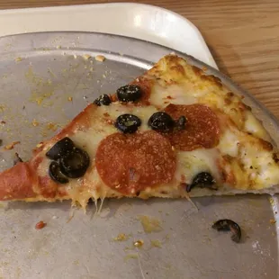 Last slice of pizza before eaten