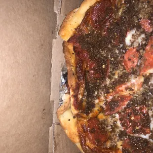 a pepperoni pizza in a box