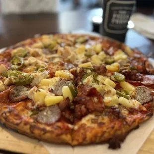 a pizza on a cutting board