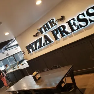 a table and chairs in a restaurant
