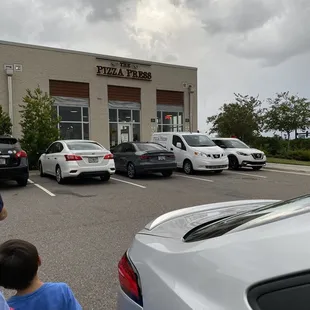 several cars parked in a parking lot