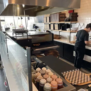 a man preparing food in the kitchen