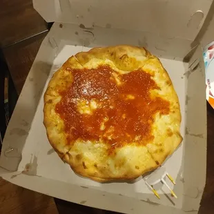 sauce dumped on top, missing from 1/3 of the pizza despite paying for extra sauce