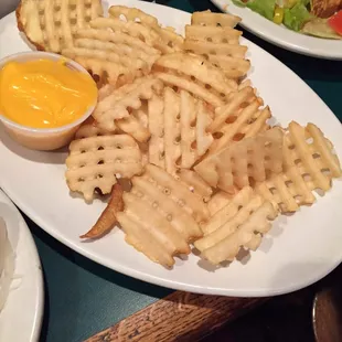 Waffle fries with cheese
