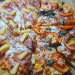 a sliced pizza in a box