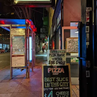 a sign for a pizza restaurant