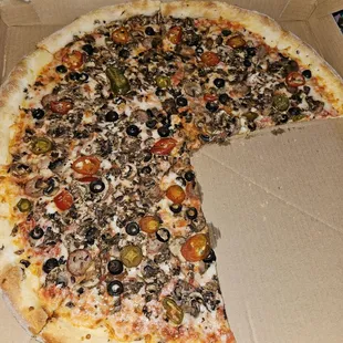 Mushroom,olives, sausage and cherry peppers- hella good!