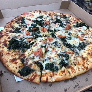 Spinach artichoke specialty pizza