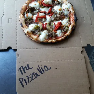 a pizza in a pizza box