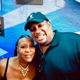 a man and a woman posing for a picture