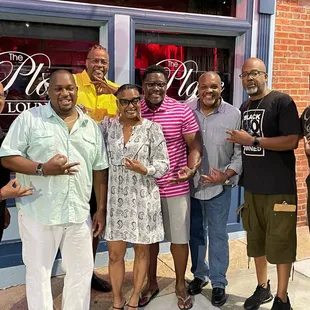 a group of people posing for a picture