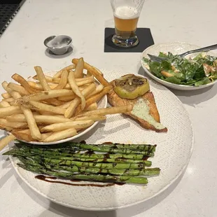 Pretty darn small piece of salmon.  Cooked juicy. Just small and medium fresh. French fries ......really ?