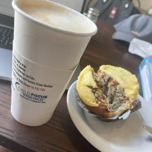 Oat milk latte and cinnamon roll