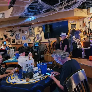 a group of people sitting at a table
