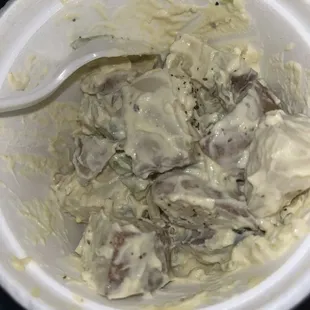 Some really hard chunks of potatoes with the skin fully in tact, mixed with mayo and pickles. I added pepper in attempt to make it edible