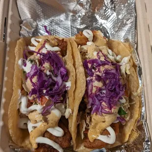 Fish Tacos w/ habanero sauce.