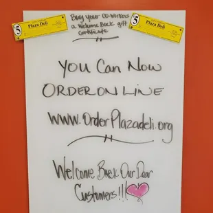 a sign that reads you can now order on line