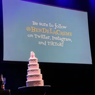 a three tiered cake on a table