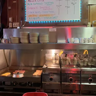 Sit at the bar &amp; watch the bartender make your food