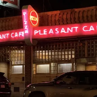 cars parked in front of the restaurant