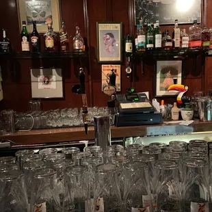 a bar filled with glasses