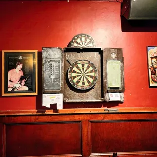 a dart in the center of the room