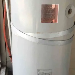 Old ugly water heater.