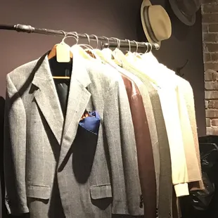 May I speak with someone about tailoring a suit, please?