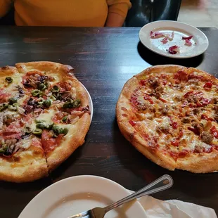 Seasonal soppressata and sausage pizzas