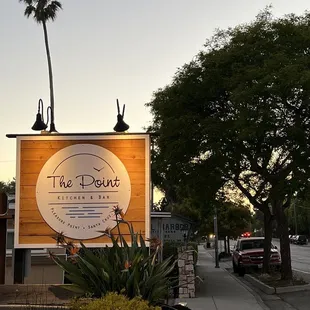 a sign on the side of the road