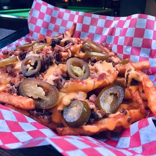 Cheesy steak fries with jalapeños