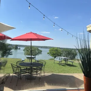 Outside seating in the sun with a view of the lake