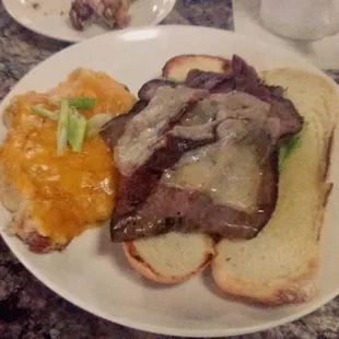 Usually I wouldn&apos;t be so excited about a sandwich, but this was really good. Roast beef and bacon, loaded baked potato on the side.