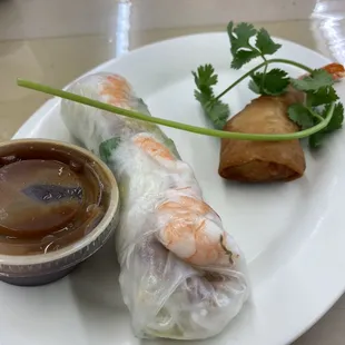 a plate of food with a dipping sauce