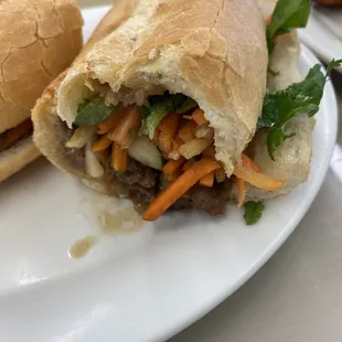 a sandwich cut in half on a plate