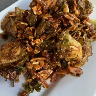 Brussel sprouts tossed in Thai chili almonds ‍