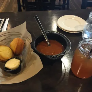 Pleasant surprise!  Apparently each meal is served with complimentary beans and cornbread muffins with honey butter.