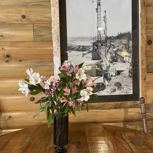 a vase of flowers on a table