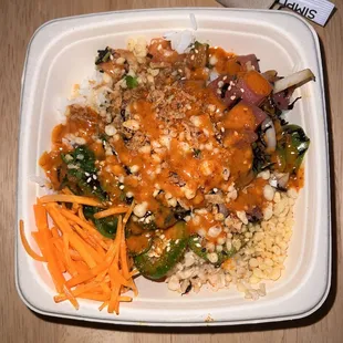 Customized bowl with basically every topping on the menu haha