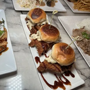 Chicken katsu sliders on Kings Hawaiian buns topped with Mac salad &amp; katsu sauce