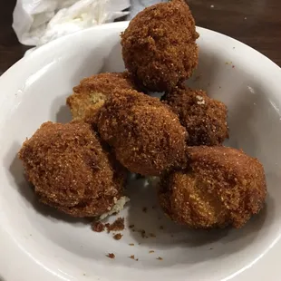 a plate of fried food on a table