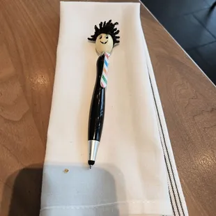 Cute pen used to add tip and sign check